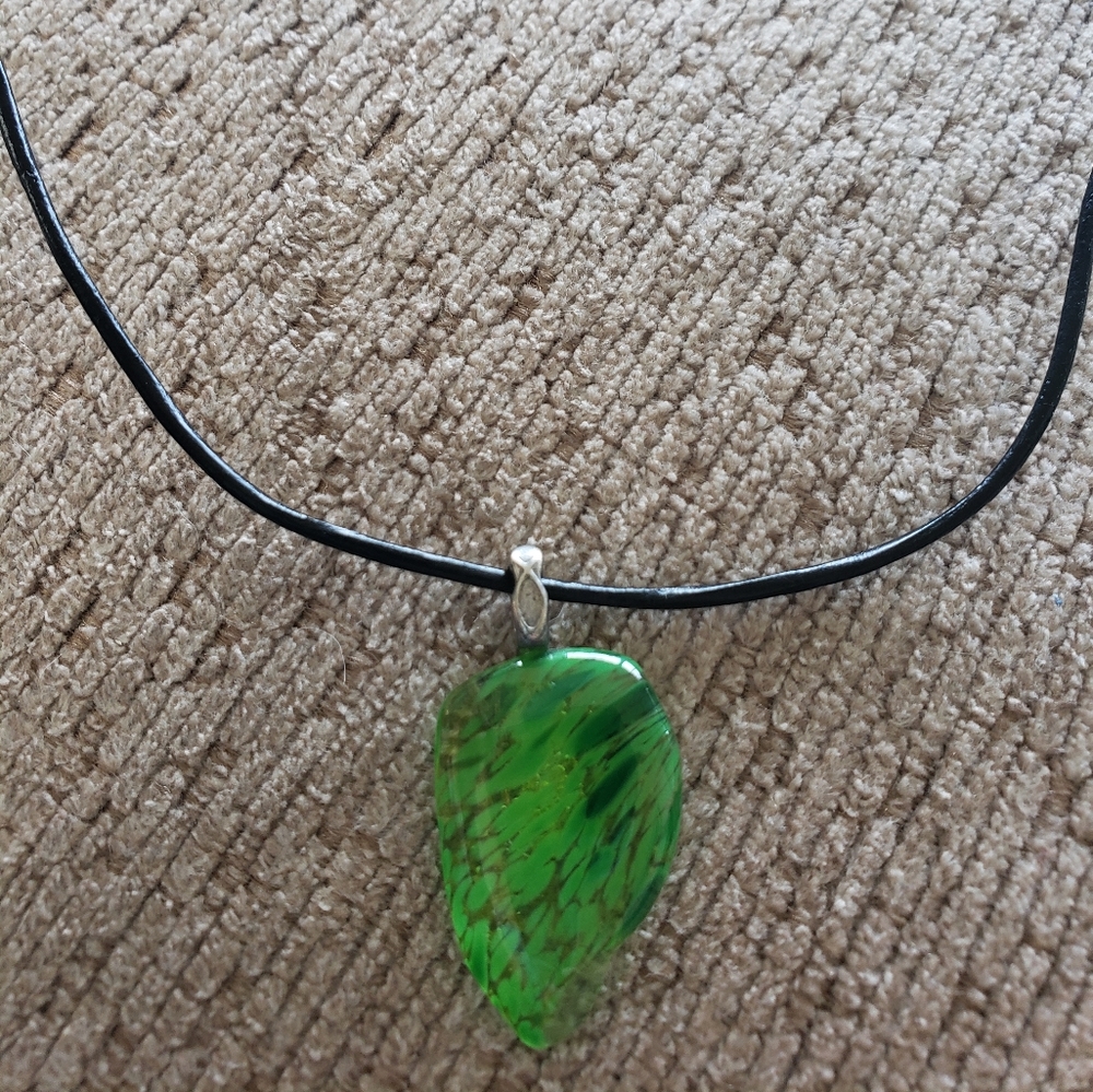 Fused glass pendant in bright green.